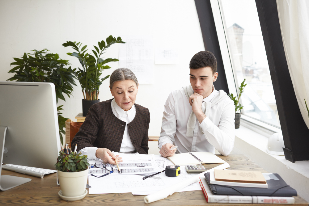 A private Business Studies tutor provides personalized exam preparation help to a student in a comfortable, distraction-free home setting in Dubai.