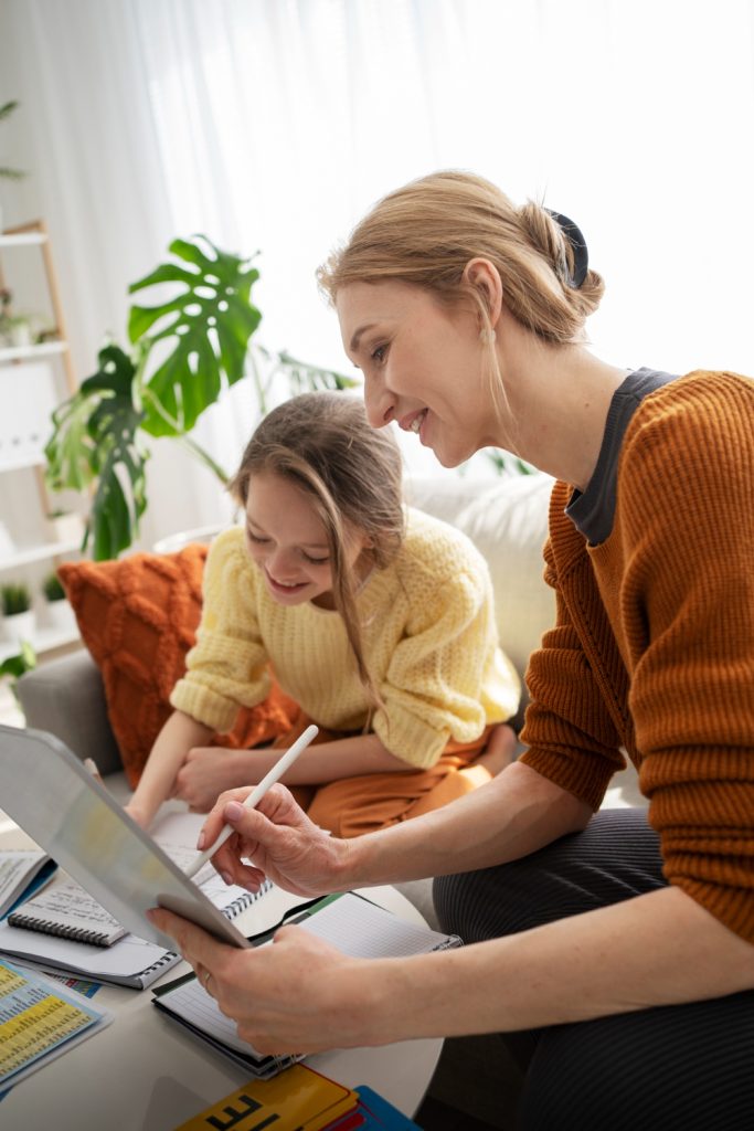 A kind and patient English tutor for kids in Dubai makes reading fun and engaging during a personalized, at-home session.