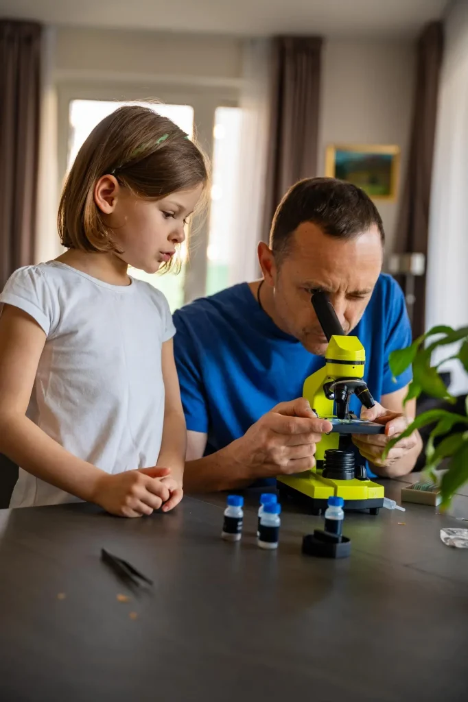 Dubai-based science specialist helping young learner explore chemistry concepts with colorful safe experiments
